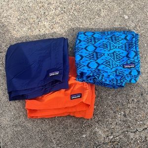 Three pairs of Patagonia youth medium swim shorts